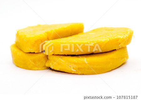 Gram flour sweets on white background with selective focus Gram flour sweets on white background with selective focus 107815187