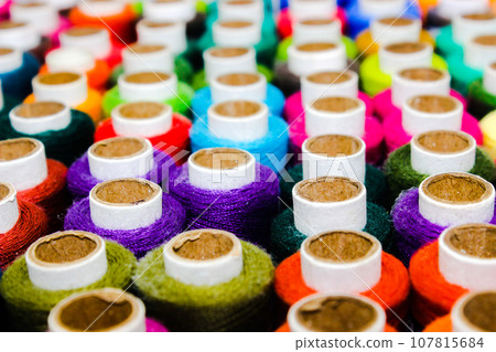 A picture of thread rolls with selective focus 107815684