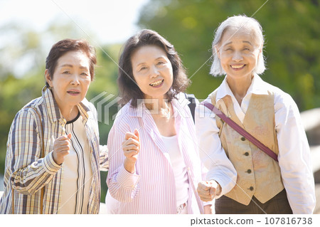 Senior woman enjoying travel Senior woman enjoying travel 107816738
