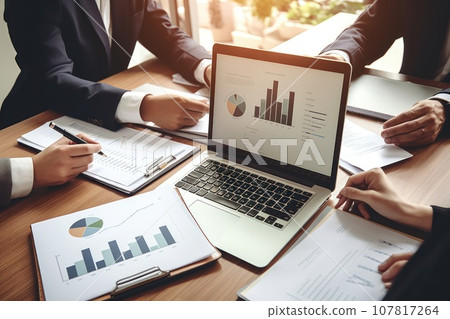 Close up Group of Business people meeting to find marketing investment analytical ideas Close up Group of Business people meeting to find marketing investment analytical ideas 107817264