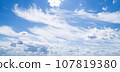 Cloudy blue sky 107819380