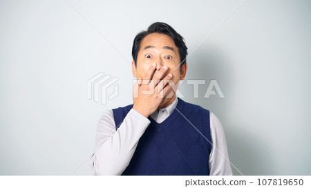 Surprised middle-aged man 107819650
