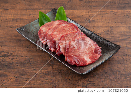 Thick-sliced beef tongue slices are essential for yakiniku 107821060