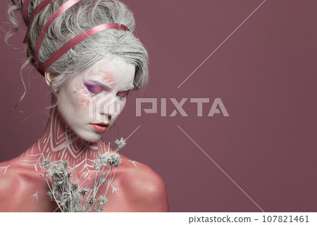 Fashion beauty portrait of glamorous woman Snow Queen or Winter Witch  107821461