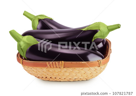 eggplant in a wicker basket isolated on white background with full depth of field 107821787