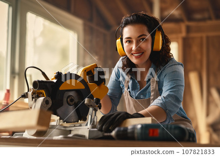 carpenter is working in workshop carpenter is working in workshop 107821833