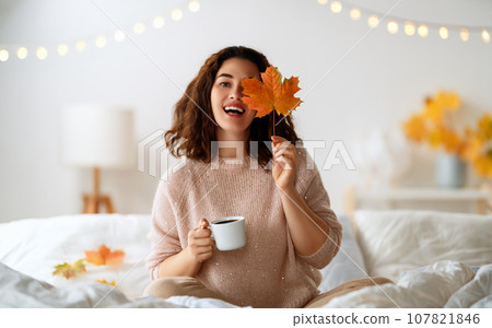 woman enjoying sunny morning 107821846