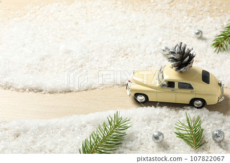 Car with a cone and New Year's decor. Car with a cone and New Year's decor. 107822067