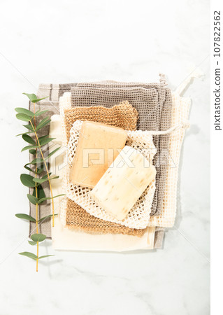 Top view photo of eco friendly personal care products on grey background 107822562