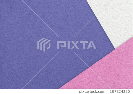 Texture of craft violet color paper background with white and lilac border. Vintage abstract very peri cardboard. 107824230