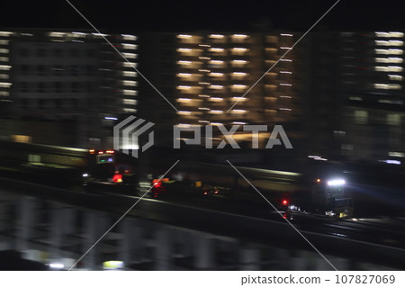 Sanyo Shinkansen track motor car passing near Himeji 107827069