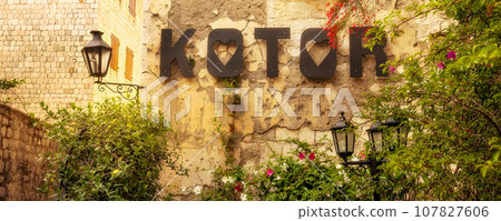 Kotor, Montenegro name sign on house wall, banner Kotor, Montenegro name sign on house wall, banner 107827606