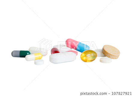 Many different colorful medication and pills perspective view. Set of many pills on colored background Many different colorful medication and pills perspective view. Set of many pills on colored background 107827921