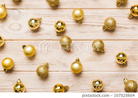 Christmas composition. a pattern of christmas balls on colored background. Flat lay, top view New year decor 107828604