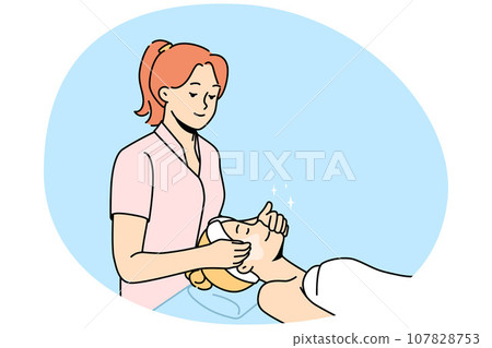 Beautician make facial procedures to female client 107828753