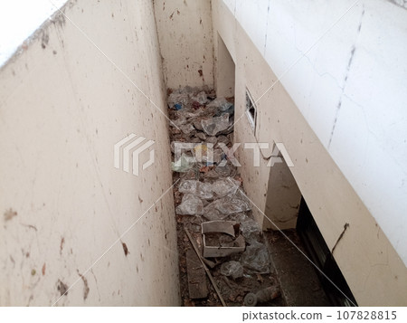upper part of the window of the ground floor of the building. Recessed windows of ancient buildings of the 19th century. upper part of the window of the ground floor of the building. Recessed windows of ancient buildings of the 19th century. 107828815