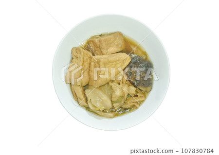 boiled tofu and textured vegetable protein vegetarian food in herb brown soup on bowl   107830784