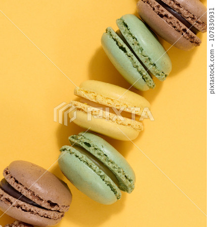 Assortment of colorful macarons, top view 107830931