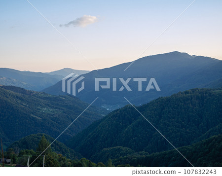 Village in Transcarpathia region scenic Carpathian mountains view Ukraine Europe Autumn countryside landscape Recreation 107832243