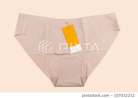 Pale purple new women's panties with a sign for text. Pale purple new women's panties with a sign for text. 107832252