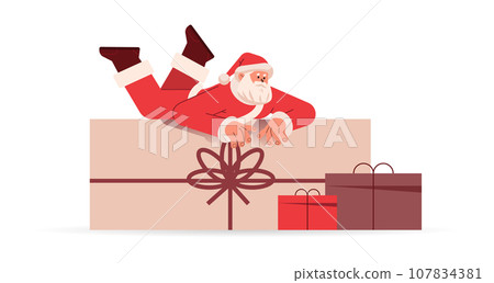 santa claus in red costume lying on wrapped gift boxes happy new year merry christmas holidays celebration concept santa claus in red costume lying on wrapped gift boxes happy new year merry christmas holidays celebration concept 107834381