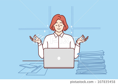 Business woman meditates sitting at office desk with papers and laptop and taking short break 107835458