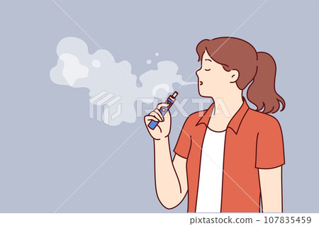 Woman vaper holds electronic cigarette for vaping and blows steam from mouth, enjoying smoking 107835459