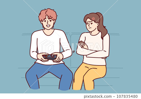 Woman is angry at husband who plays video game and does not want to do housework 107835480