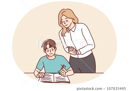 Teacher control pupil writing in notebook 107835495
