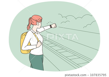 Woman on platform experience train delay Woman on platform experience train delay 107835795