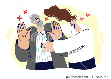 Woman tries to hug resisting man who does not want intimacy and shows stop gesture with hands 107835944