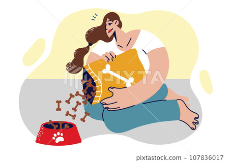 Woman pours dry nutrition into dog bowl, recommending feeding puppies special food 107836017