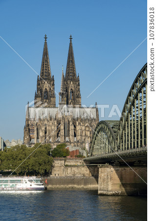 Cologne Cathedral and Hohenzollern Bridge daylight view 107836018