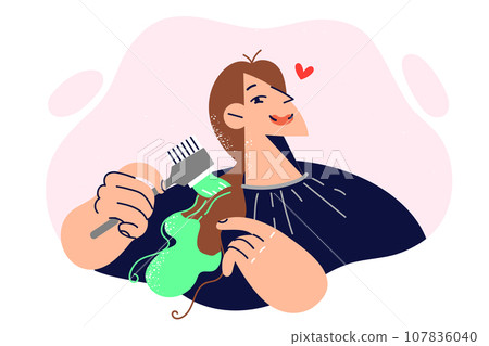 Woman dyes hair herself and holds brush with green paint, wanting to change style and update look Woman dyes hair herself and holds brush with green paint, wanting to change style and update look 107836040