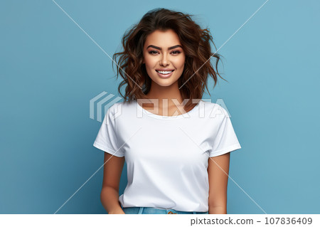 A Young Woman Showcases a Bella Canvas White Shirt Mockup Against a Striking Blue Background, the Ultimate T-Shirt Design Template and Print Presentation Mock-Up. created with Generative AI A Young Woman Showcases a Bella Canvas White Shirt Mockup Against a Striking Blue Background, the Ultimate T-Shirt Design Template and Print Presentation Mock-Up. created with Generative AI 107836409