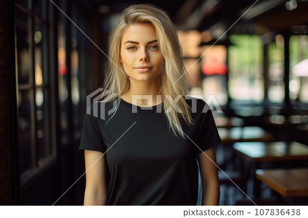 A Young Blonde Woman Dons a Bella Canvas Black T-Shirt and Jeans, Savoring Sunshine at a Cozy Restaurant, Featuring a T-Shirt Design Template and Print Presentation Mockup. created with Generative AI 107836438