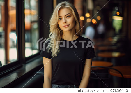 A Young Blonde Woman Dons a Bella Canvas Black T-Shirt and Jeans, Savoring Sunshine at a Cozy Restaurant, Featuring a T-Shirt Design Template and Print Presentation Mockup. created with Generative AI 107836440