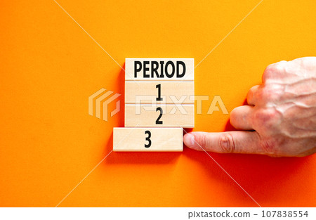 Time to period 3 symbol. Concept word Period 1 2 3 on wooden block. Businessman hand. Beautiful orange table orange background. Business planning and time to period 3 concept. Copy space. Time to period 3 symbol. Concept word Period 1 2 3 on wooden block. Businessman hand. Beautiful orange table orange background. Business planning and time to period 3 concept. Copy space. 107838554