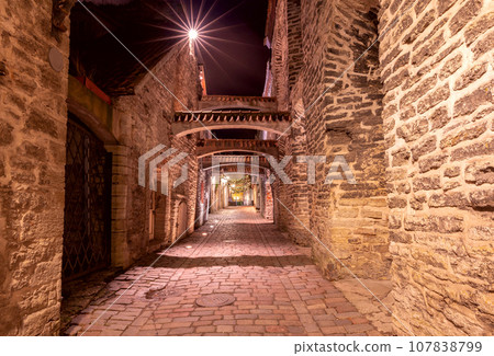 St. Catherine Street illuminated at night. Tallinn. St. Catherine Street illuminated at night. Tallinn. 107838799
