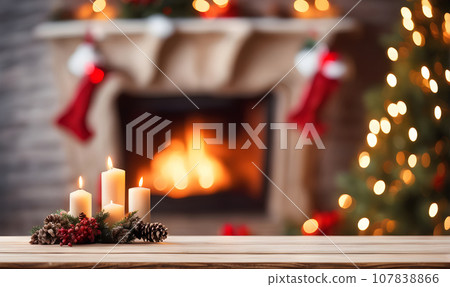 Christmas table with blurred fireplace backdrop 107838866