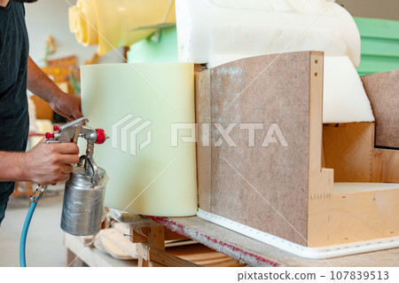 Furniture manufacture and upholstery in furniture factory Furniture manufacture and upholstery in furniture factory 107839513