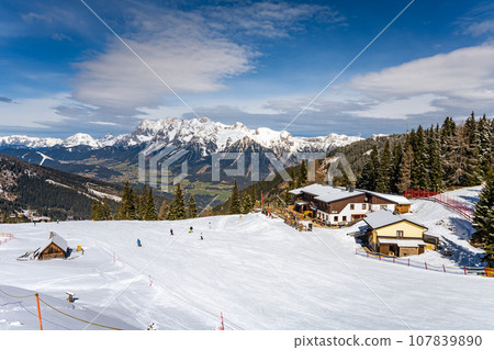 Schladming alpine ski resort with Dachstein Mountain on background, Keibling Alm area, Austria Schladming alpine ski resort with Dachstein Mountain on background, Keibling Alm area, Austria 107839890