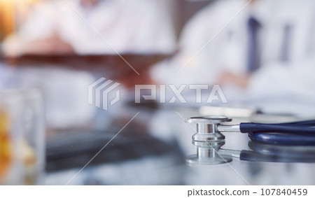 Medical concept image. Stethoscope on the table close-up. Medical concept image. Stethoscope on the table close-up. 107840459