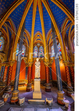 Lower chapel of Sainte-Chapelle with statue of Louis IX. Palais de la Cite, Paris, France 107841193
