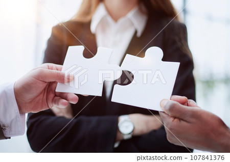 connect two puzzle pieces concept of business solution solving a problem Generative AI 107841376