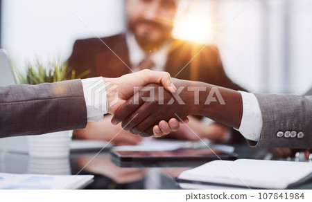 Detail of a varied business handshake. success concept Detail of a varied business handshake. success concept 107841984