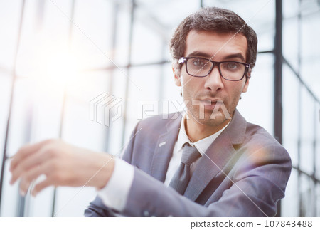young man having online conference from home young man having online conference from home 107843488