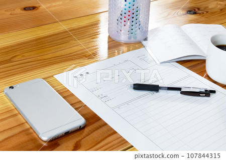 An unfilled resume and an open schedule book for April An unfilled resume and an open schedule book for April 107844315