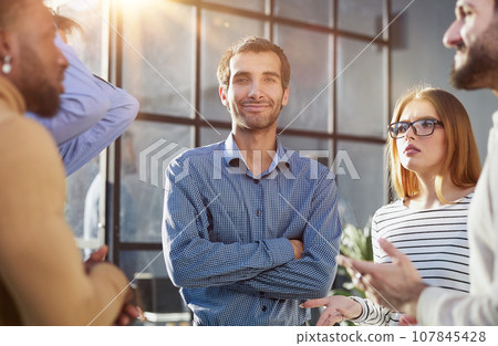 Business conversations of different people during an office walk Business conversations of different people during an office walk 107845428