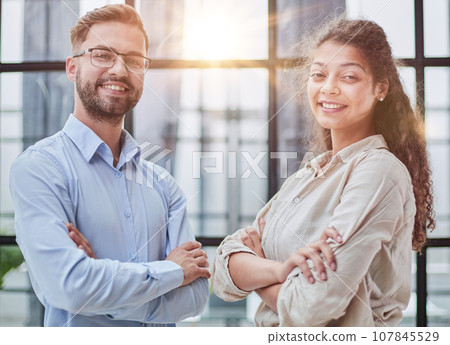 Business Colleagues Having Meeting Together At Office Business Colleagues Having Meeting Together At Office 107845529